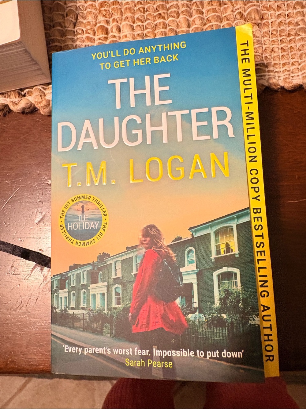 2/7.00 book = The Daughter by T.M. Logan
Thriller Paperback